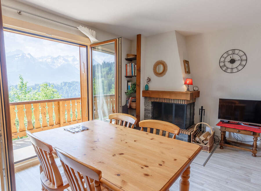 Experience breathtaking mountain views from this charming property.