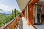 Enjoy breathtaking mountain views from this stunning balcony.