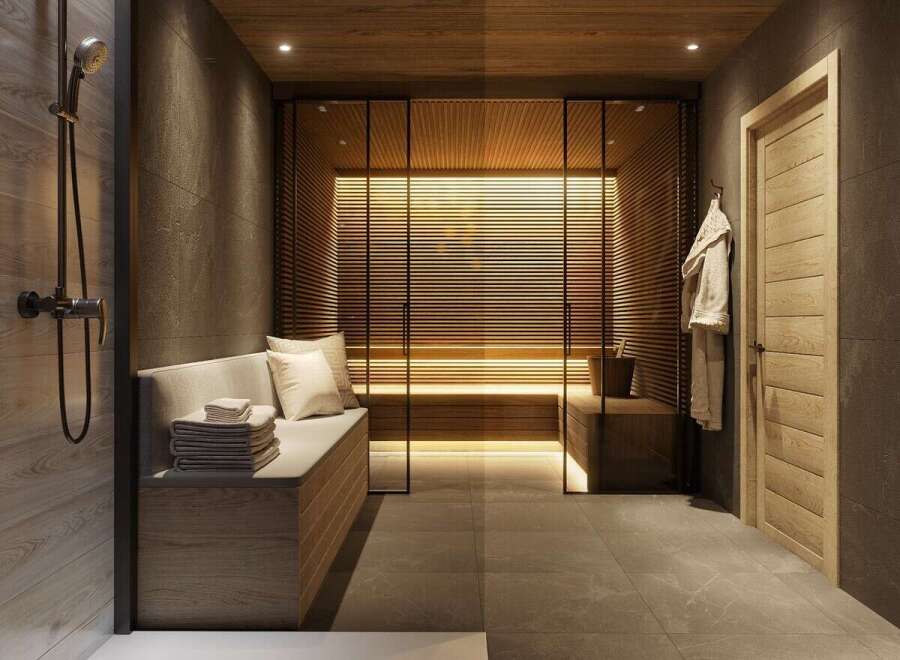 Luxurious spa-like bathroom with a sauna and a modern shower.