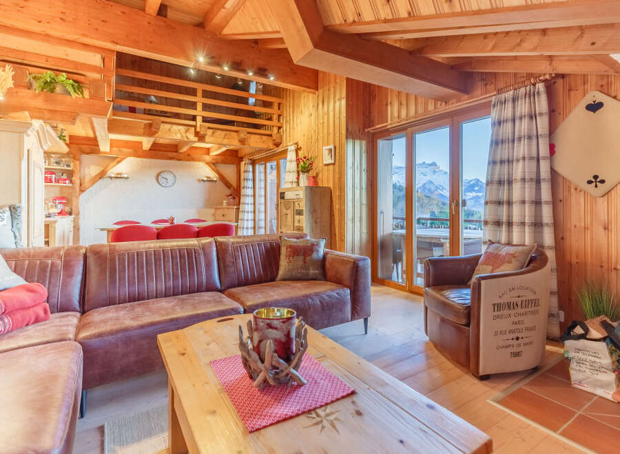 Experience the warmth of a cozy chalet with stunning mountain views.