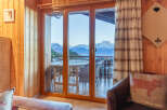 Enjoy breathtaking mountain views from this cozy cabin.