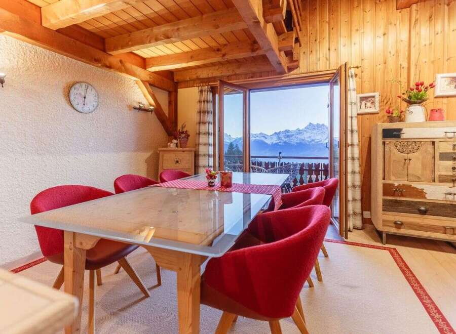 Experience breathtaking mountain views from this charming chalet.