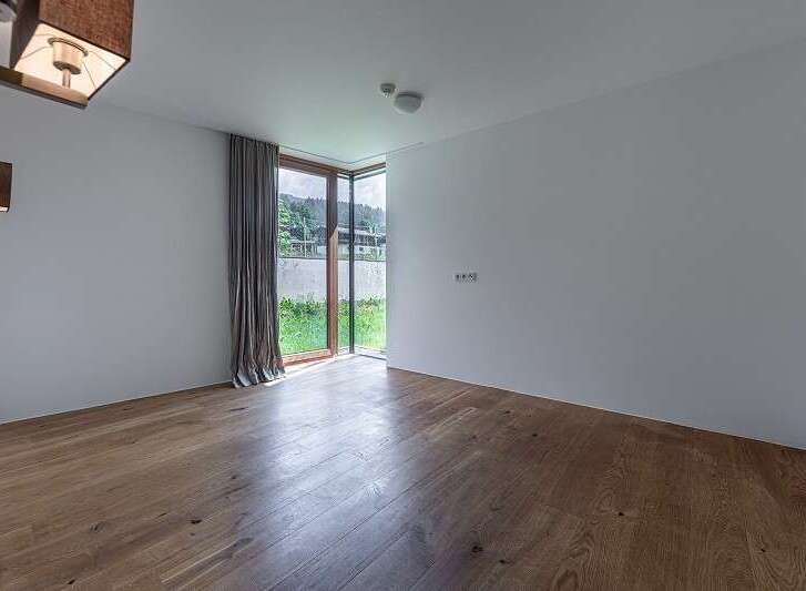 Discover a bright and airy interior with stunning hardwood floors.