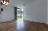 Discover a bright and airy interior with stunning hardwood floors.