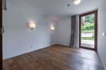 Discover a bright and airy room with beautiful hardwood floors.