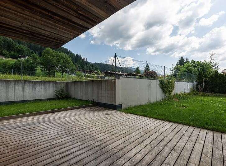 Enjoy the tranquility of this stunning property with a beautiful wooden deck.
