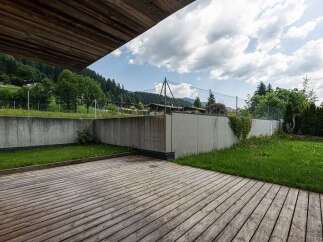 Enjoy the tranquility of this stunning property with a beautiful wooden deck.