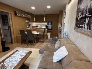 This stunning property boasts a modern open-plan living space, perfect for entertaining.
