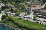 Discover this stunning lakeside property featuring modern apartments and a charming hotel.