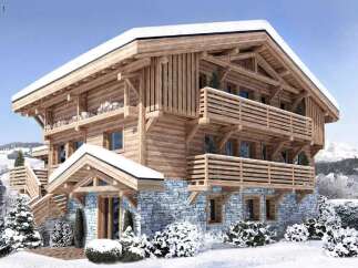 This stunning chalet boasts a beautiful exterior with a blend of wood and stone.