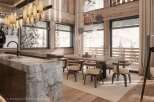This stunning chalet boasts a spacious dining area with breathtaking views, perfect for enjoying meals with loved ones.