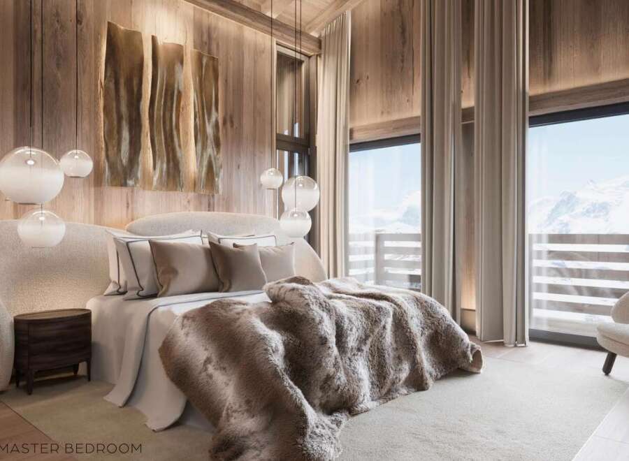 Luxurious master bedroom with stunning mountain views.