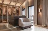 Luxurious master bedroom with walk-in closet featuring ample storage and built-in lighting.