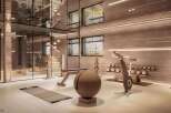 Luxury home gym with state-of-the-art equipment and stunning design.