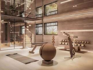 Luxury home gym with state-of-the-art equipment and stunning design.