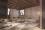 This stunning living room boasts a cozy and sophisticated atmosphere, featuring a unique patterned wallpaper and a comfortable sectional sofa.