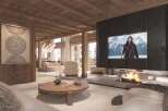Luxury chalet with stunning mountain views and a cozy fireplace.