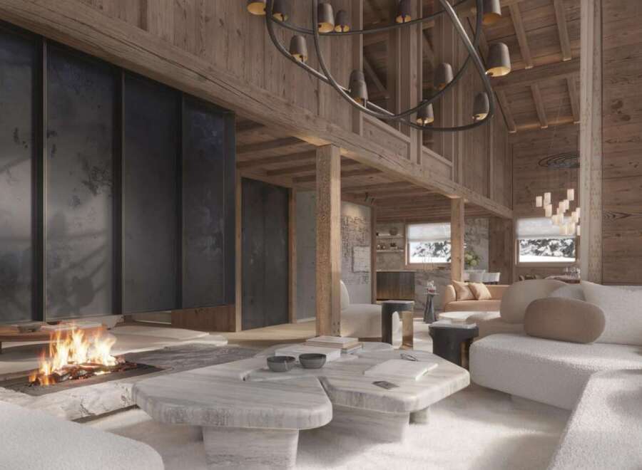 This stunning chalet boasts a spacious open-plan living area with a cozy fireplace, perfect for relaxing after a day on the slopes.