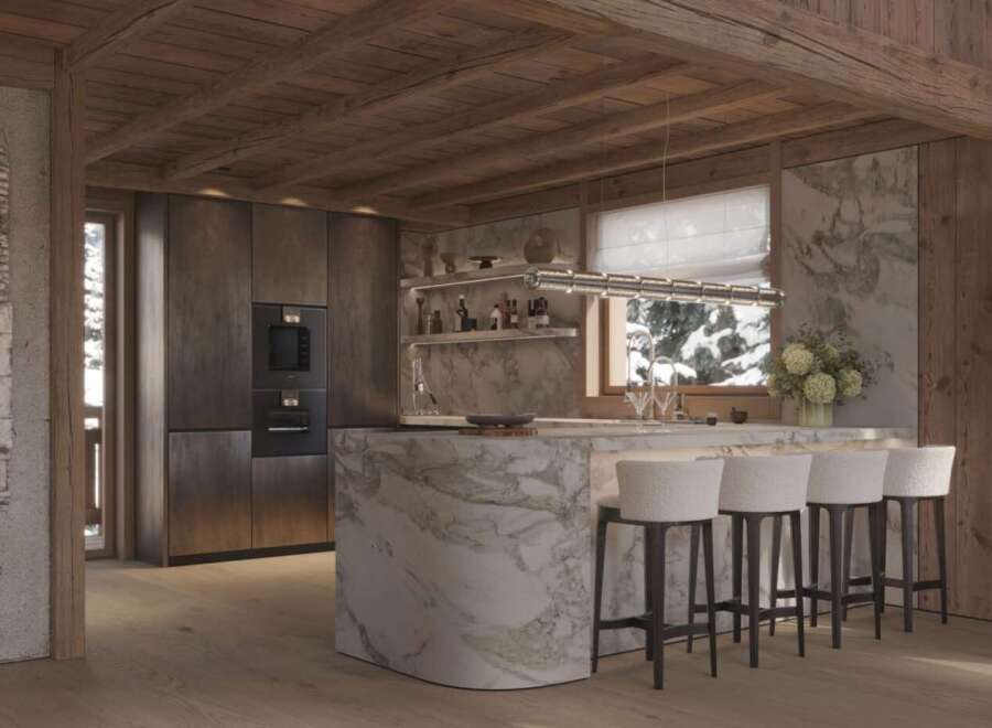 This stunning chalet boasts a luxurious kitchen with marble island and bespoke cabinetry.