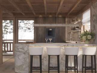 This stunning kitchen boasts a marble island with built-in seating, perfect for entertaining.