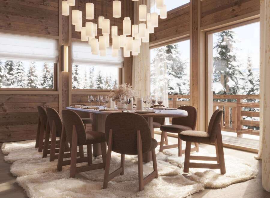 Luxurious chalet with stunning mountain views and a spacious dining area.