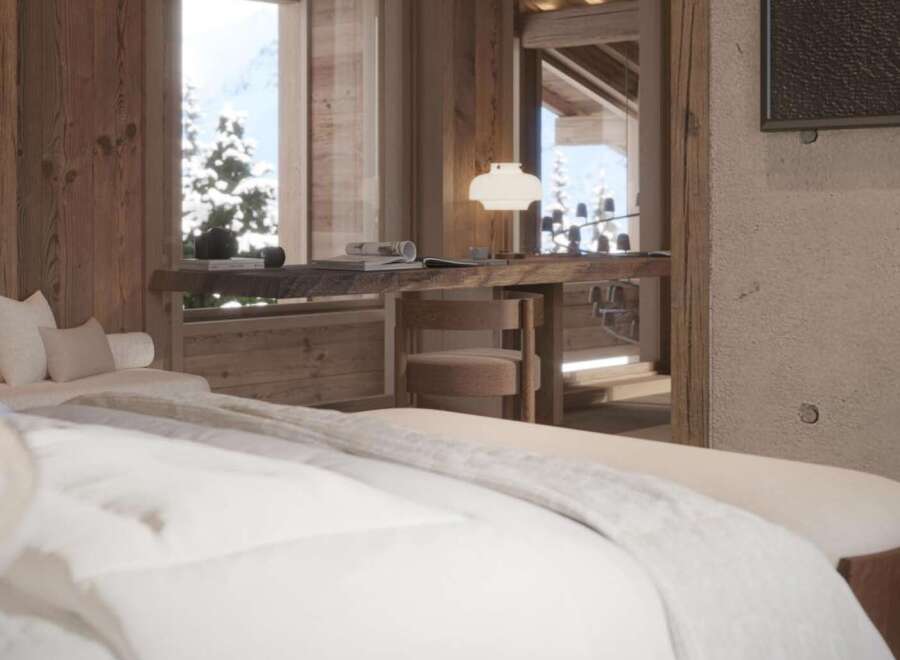 Luxurious chalet bedroom with stunning mountain views.