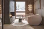 Cozy mountain chalet with stunning views and a modern fireplace.