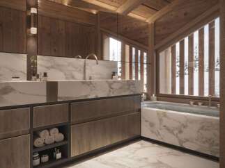 Luxurious bathroom with marble finishes and wooden accents.
