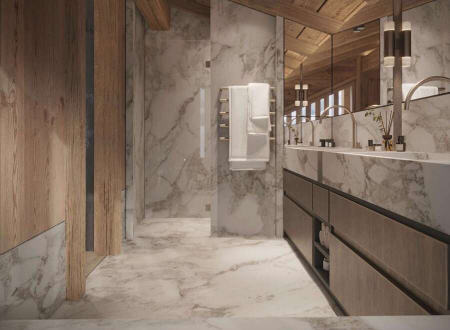 Luxurious bathroom with marble flooring and walls, wooden accents, and a double vanity.