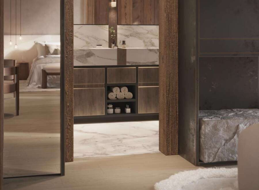 Luxury bathroom with marble vanity and wooden cabinetry, offering a serene and spa-like atmosphere.