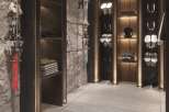 This luxurious ski room boasts custom built-in cabinetry, sleek modern design, and ample storage for all your winter gear.