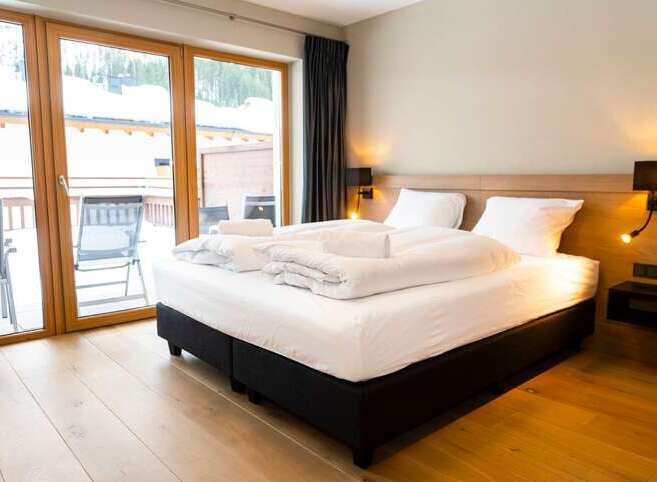 Experience ultimate comfort in this beautifully designed bedroom.