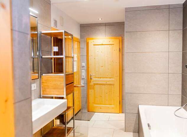 Step into a beautifully designed bathroom featuring a modern aesthetic.