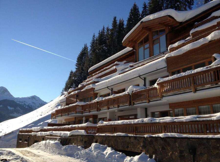 Experience the ultimate winter getaway at this stunning mountain lodge.