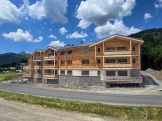 Discover the charm of this stunning wooden-clad property, offering a blend of modern design and natural beauty.
