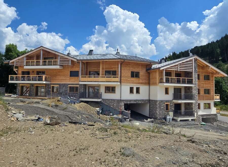 Discover a stunning mountain chalet boasting exquisite wooden architecture and modern design.