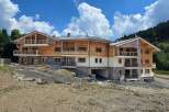 Discover a stunning mountain chalet boasting exquisite wooden architecture and modern design.