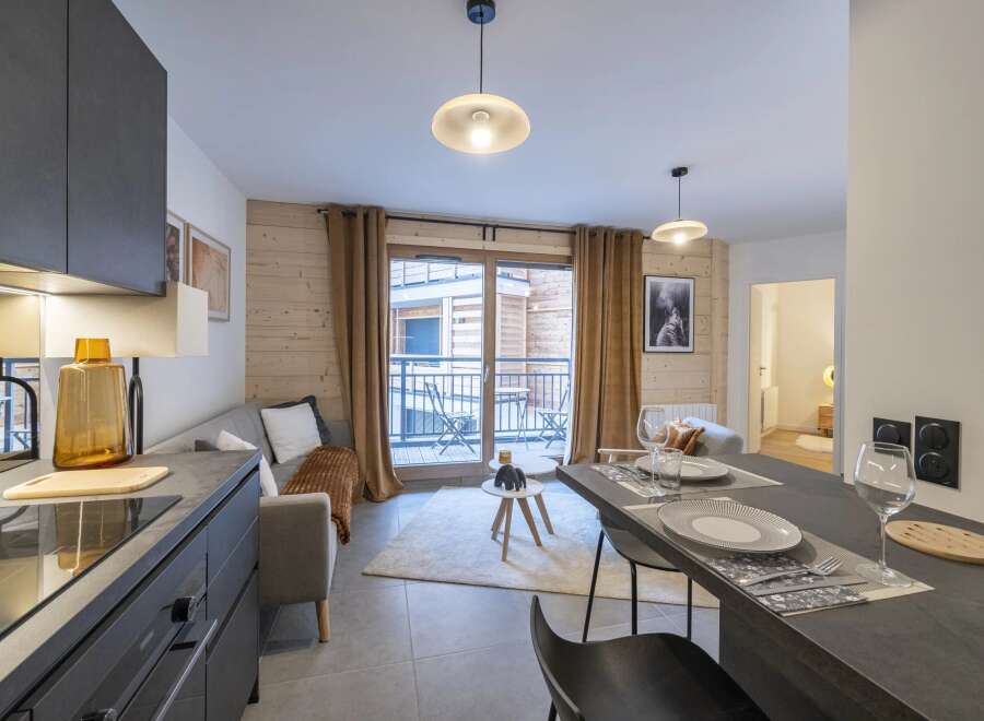 Discover modern living in this stylish apartment! Featuring a sleek kitchen, cozy living area, and a dining space perfect for entertaining.