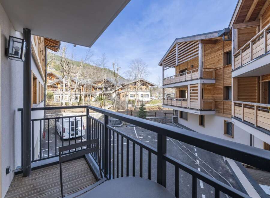 Enjoy breathtaking mountain views from this stunning balcony.