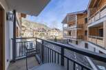 Enjoy breathtaking mountain views from this stunning balcony.