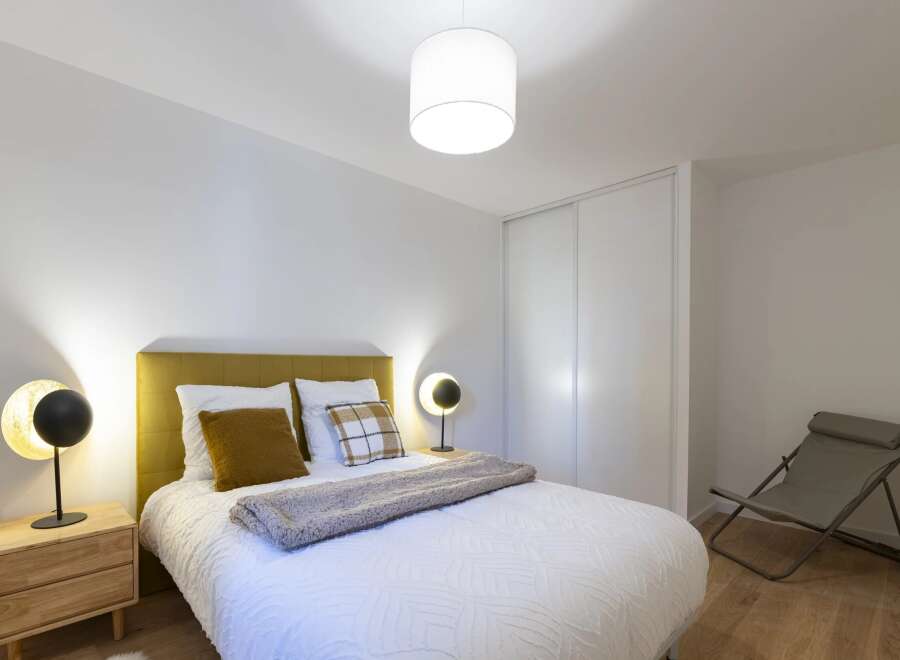 Step into a serene bedroom retreat, designed for ultimate comfort and style.