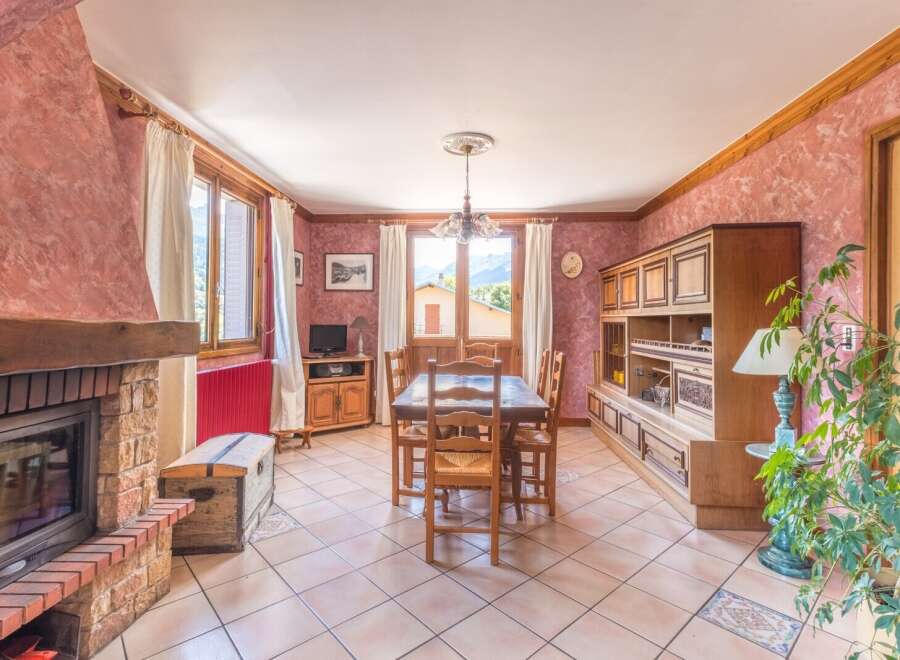 This charming property boasts a cozy dining area, perfect for intimate gatherings.