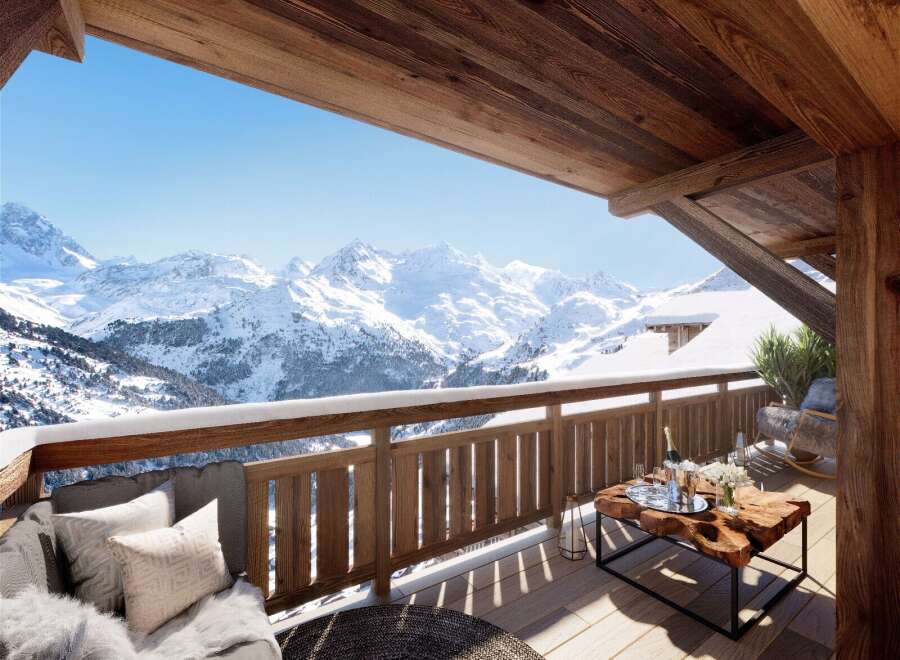 Experience the ultimate alpine escape with breathtaking mountain views from this luxurious chalet.