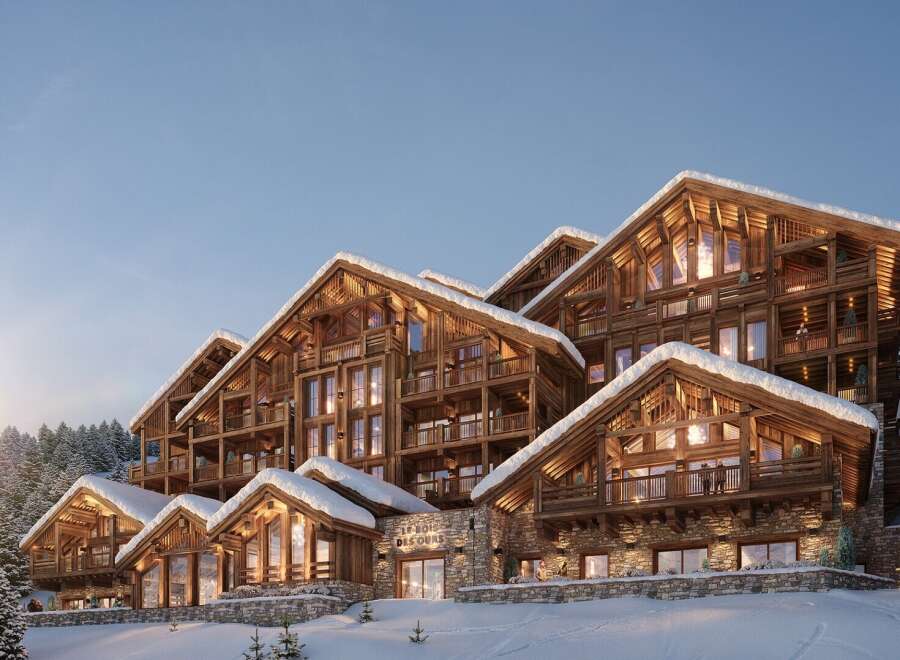 Experience luxury at Le Bois des Ours, a stunning chalet nestled in a snowy paradise.
