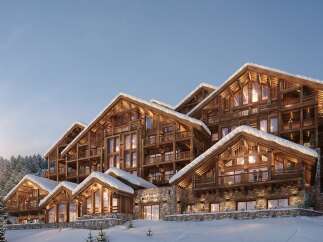 Experience luxury at Le Bois des Ours, a stunning chalet nestled in a snowy paradise.