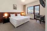 Enjoy a cozy stay in this well-appointed hotel room.