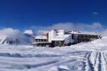 Experience the ultimate winter getaway at this stunning snow-covered resort.