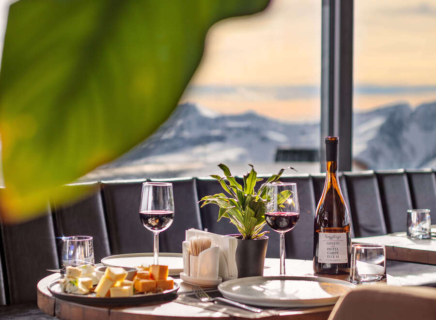 Enjoy a luxurious dining experience with breathtaking mountain views.