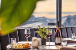 Enjoy a luxurious dining experience with breathtaking mountain views.