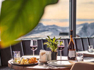 Enjoy a luxurious dining experience with breathtaking mountain views.